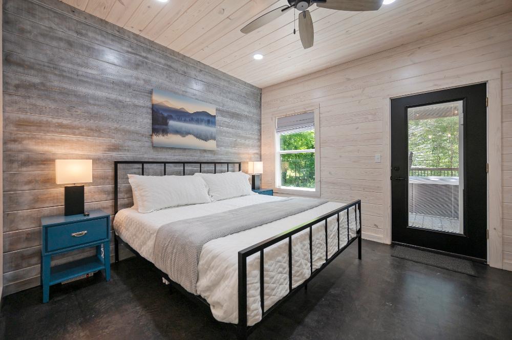 Located just steps from the hot tub, this king suite offers easy access to outdoor relaxation.
