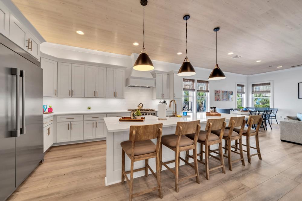 Whip up your family favorites in this sleek kitchen with high-end appliances and plenty of space to cook together.