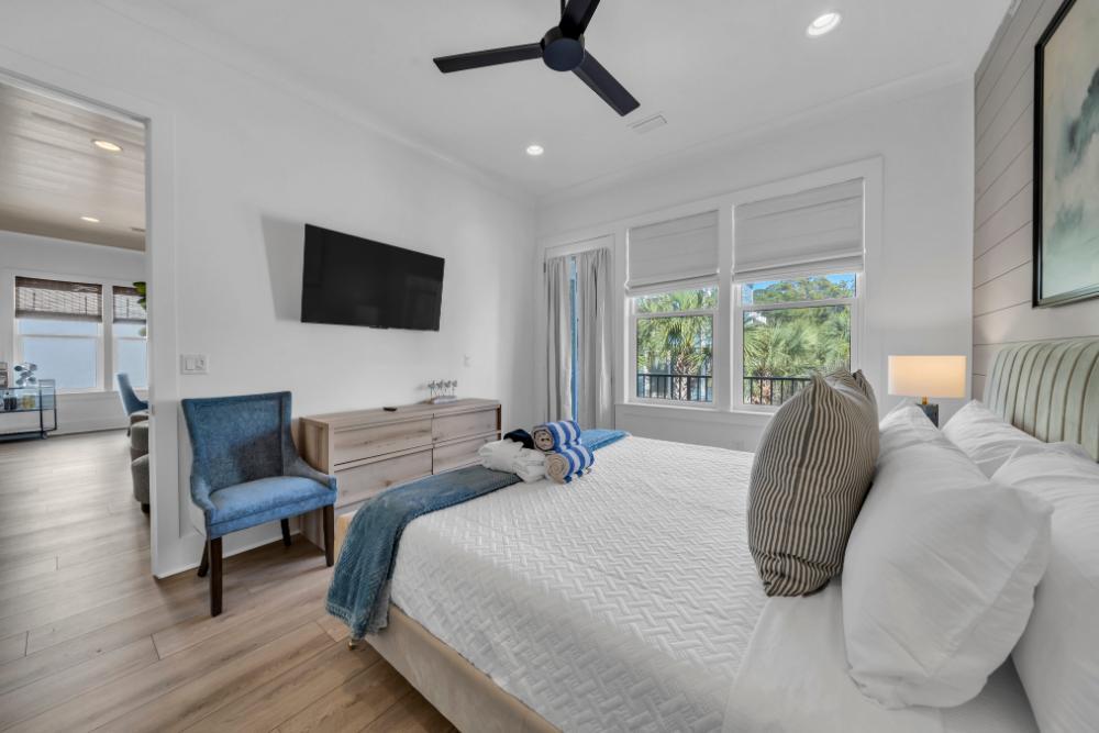 No stairs needed—this cozy master suite is tucked right beside the living room for extra convenience.
