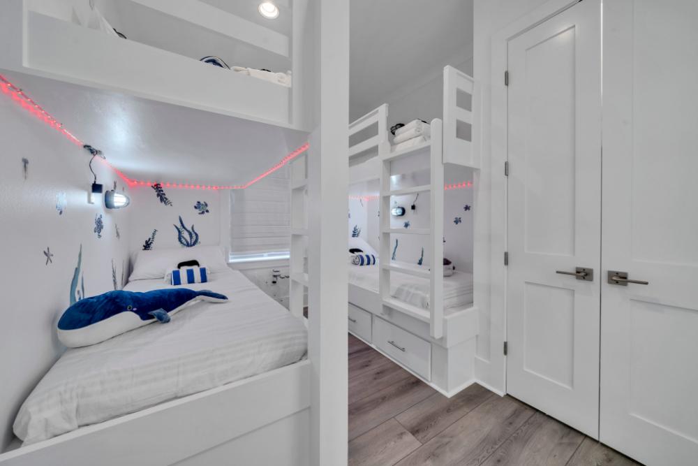 Get ready for giggles and sleepovers—four cozy twin bunks make this the ultimate kid hangout!