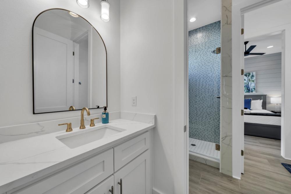 Everyone gets their own sink! Separate vanities plus a shared shower make mornings easy for both kids and adults.