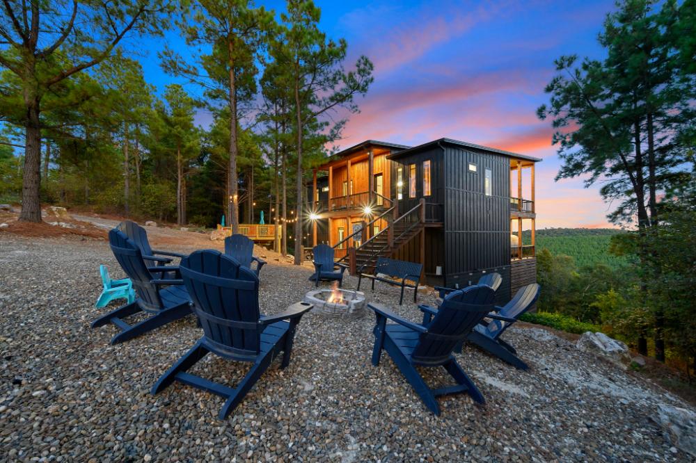 A fire pit ready for s'mores, late night conversations, and a sky full of stars. Mountain evenings do not get better than this.
