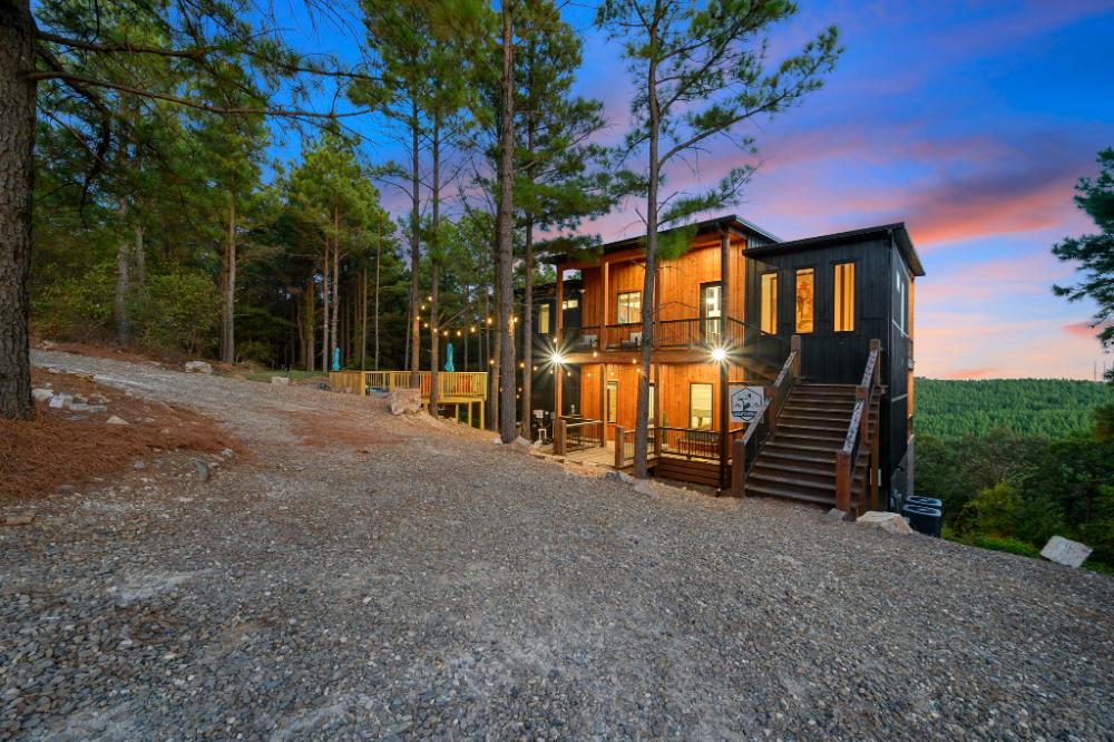 A getaway by Great Escapes Homes where the views impress and the comfort keeps you coming back. This one tends to become a favorite.
