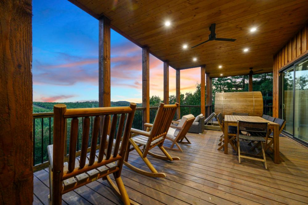 A versatile deck space ready for outdoor games, quiet mornings, or anything in between. Good vibes come standard with the mountain views.