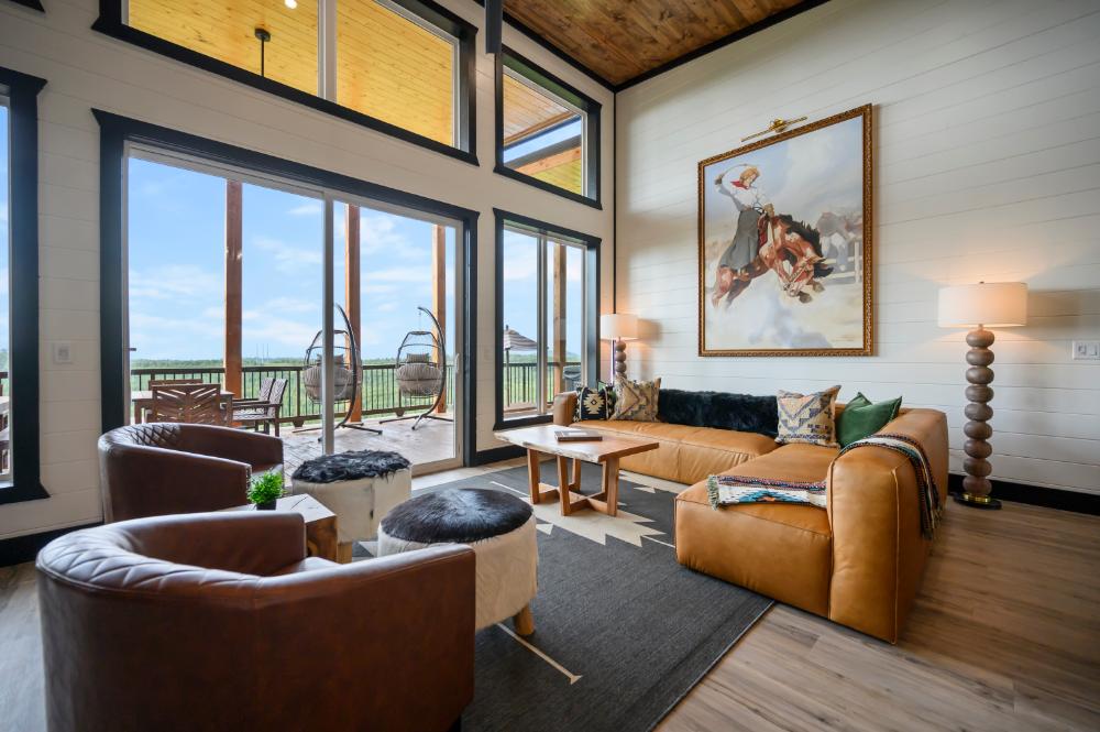 A spacious Western-themed living area with enough room for the whole group to spread out, get comfortable, and settle into the mountain pace.