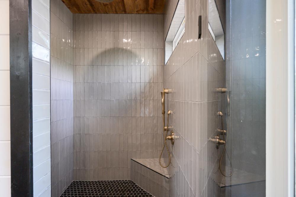 A beautifully appointed shower setup that turns a basic rinse into a genuine moment of relaxation. Spa quality without leaving the property.
