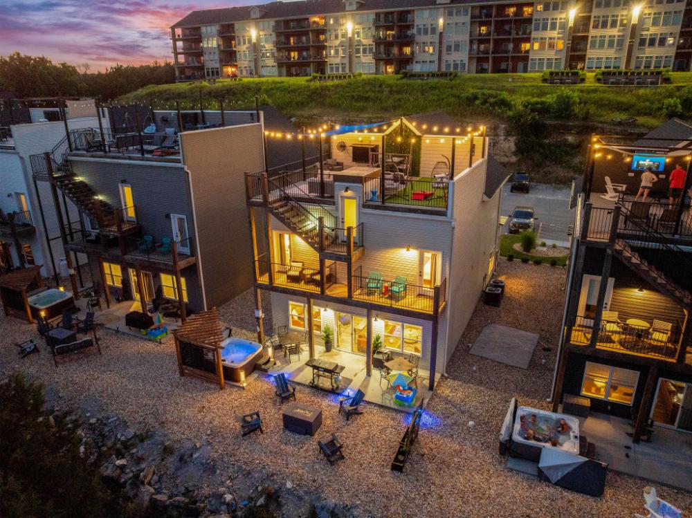 Soak in sweeping lake views from the rooftop deck or private bedroom balconies, perfect for morning coffee or sunset drinks.