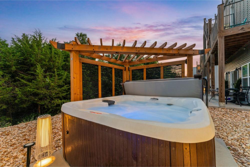 Relax in the bubbling hot tub just steps from the water and settle into true lakefront living.