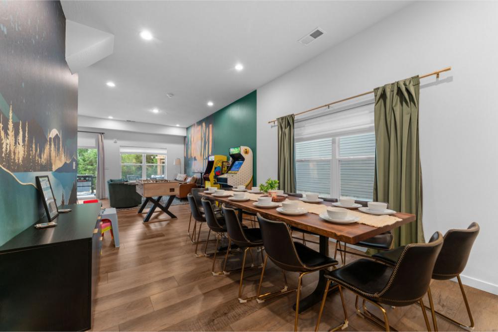 Gather for meals, card games, and conversation around this beautiful custom dining table with lake views.