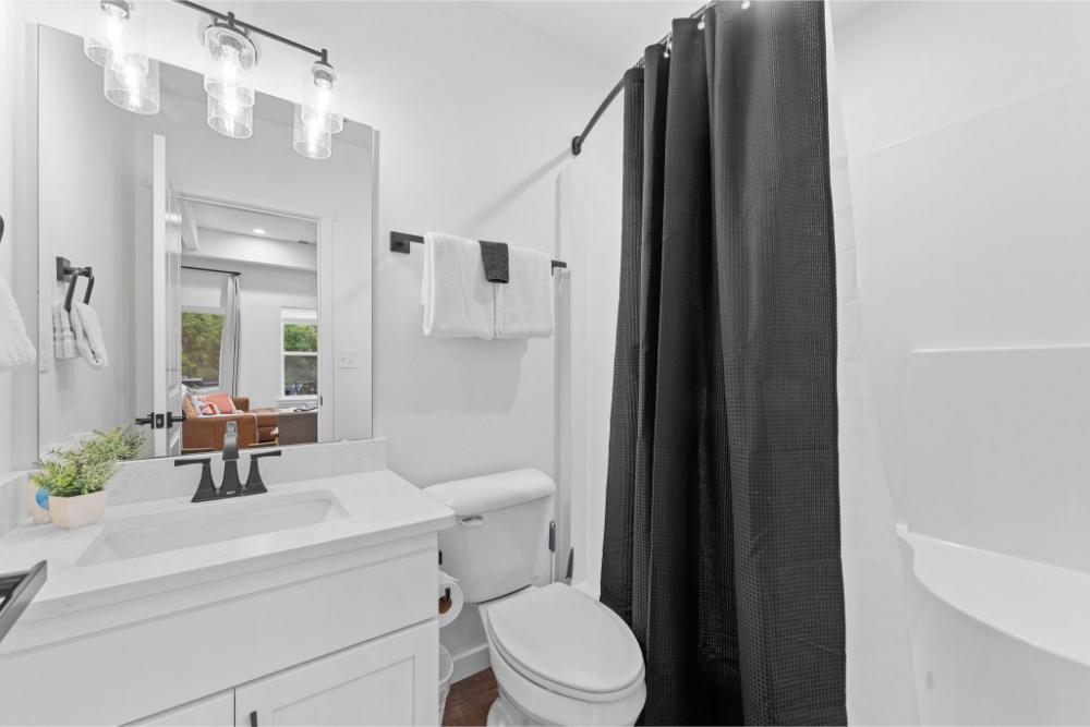 Freshen up with ease in the spacious walk in shower. Clean, modern, and conveniently located on the main floor.