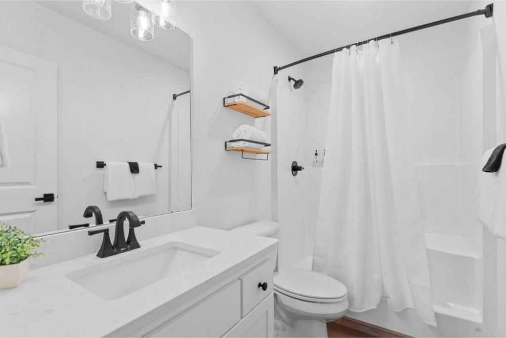 Whether you are winding down with a soak or getting ready for the day, this bathroom gives you the space and comfort you need.