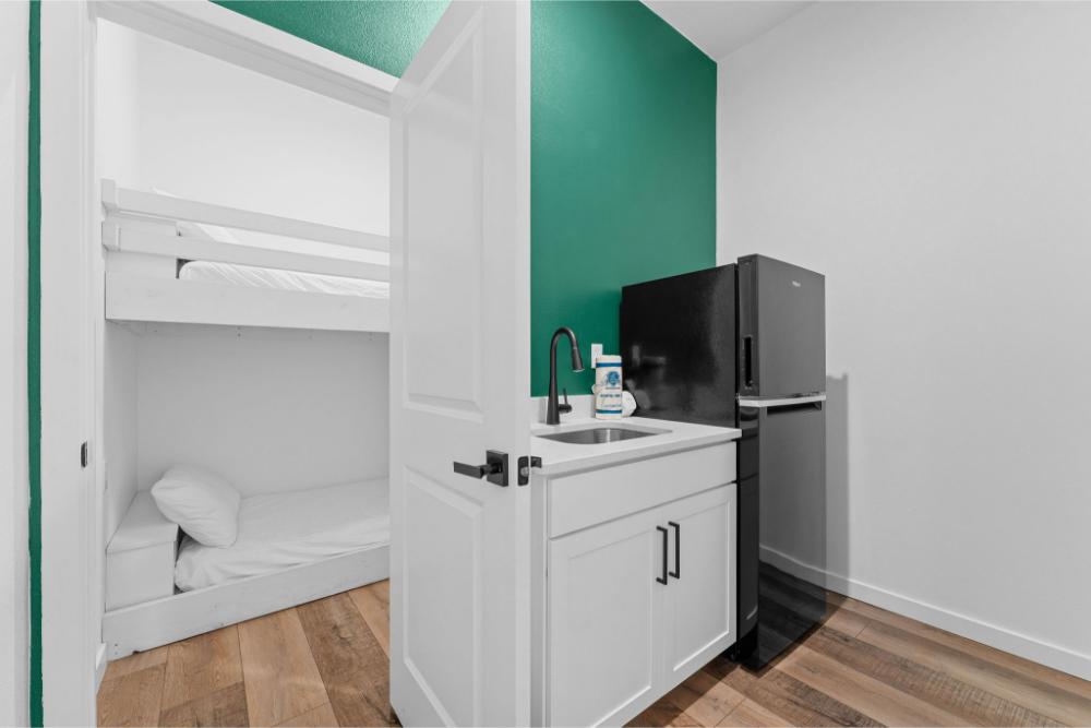 Midnight snack or early morning coffee? The upstairs kitchenette makes it easy to grab what you need without heading downstairs.