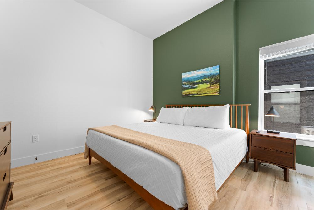 The Buffalo Ridge Room features a king bed, Smart TV, and private bathroom for a comfortable stay.