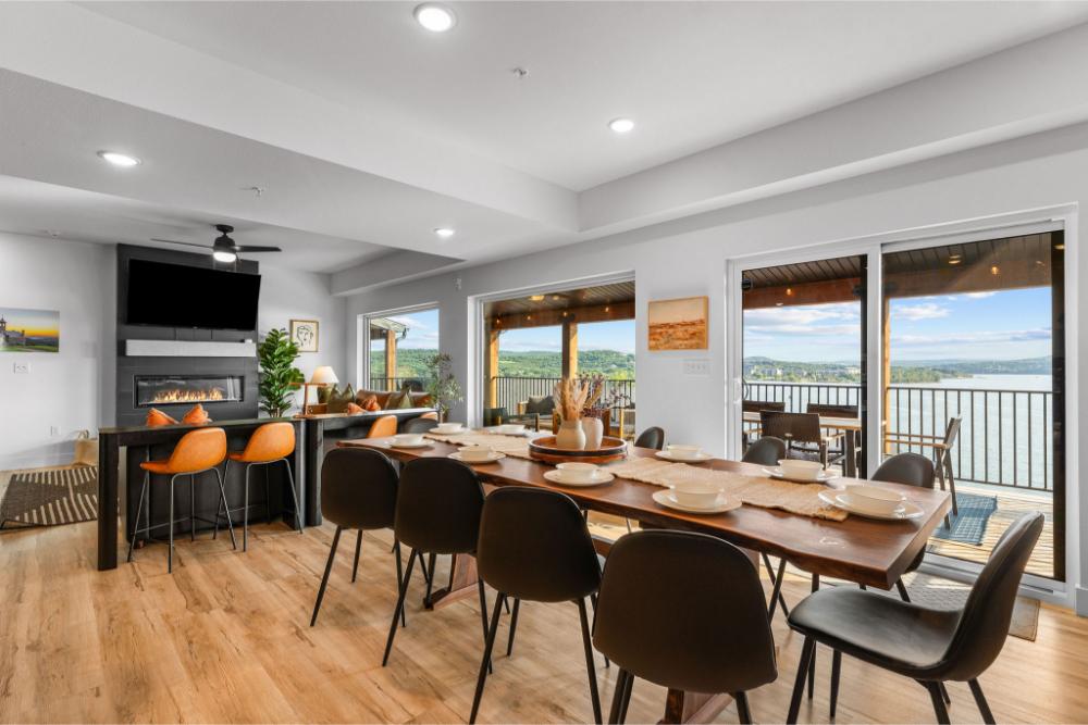 Spend time together cooking, relaxing, and enjoying beautiful lake views in this spacious central gathering area.