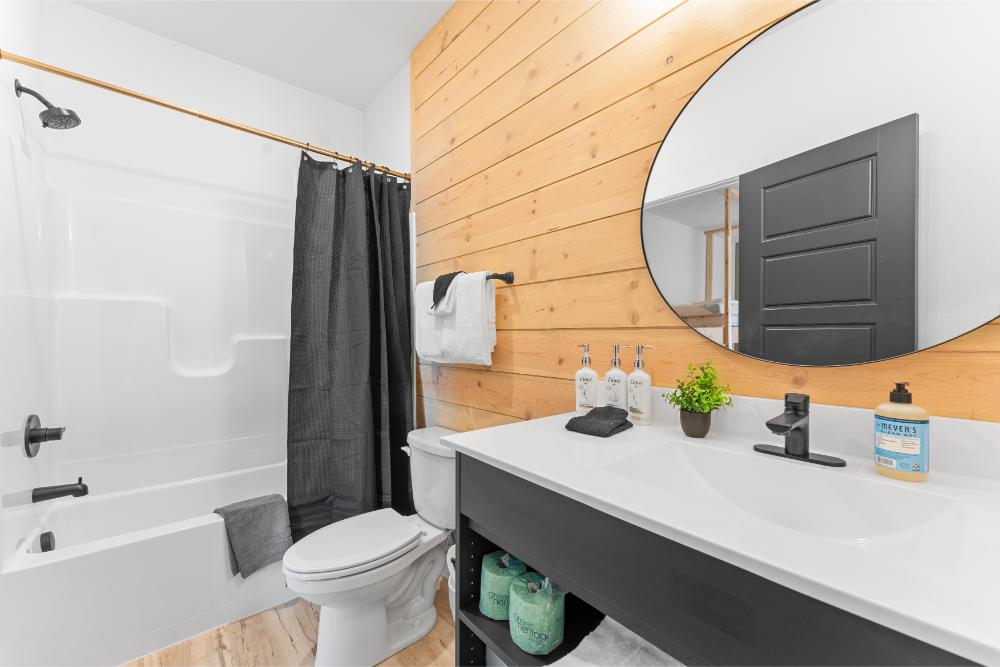 Private ensuite bathroom features a tub and shower combination for both convenience and relaxation.