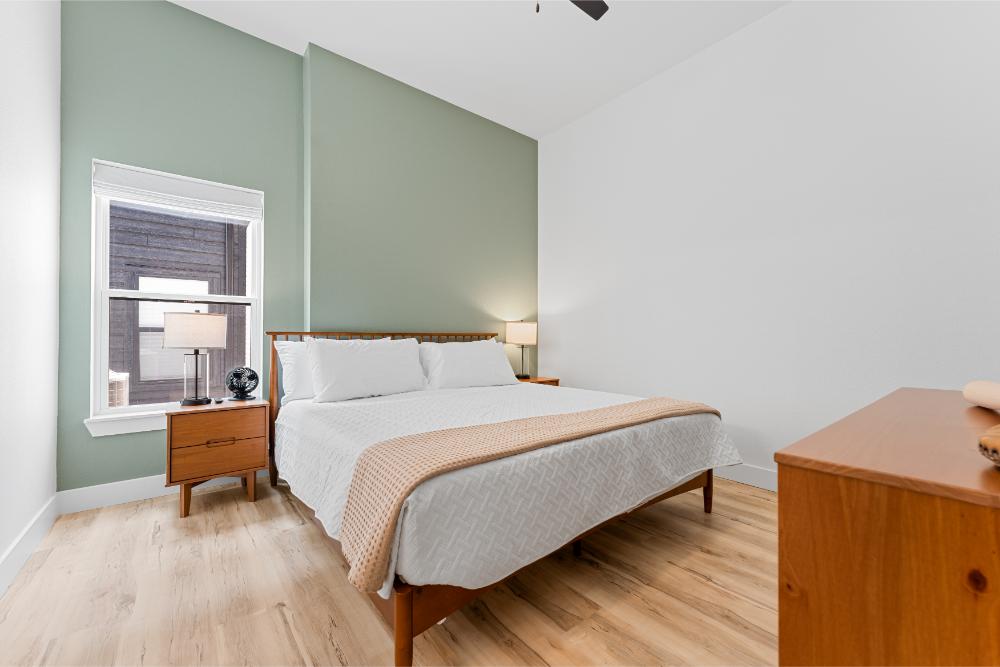 Private bathroom features both a soaking tub and shower, offering options for relaxation and convenience.