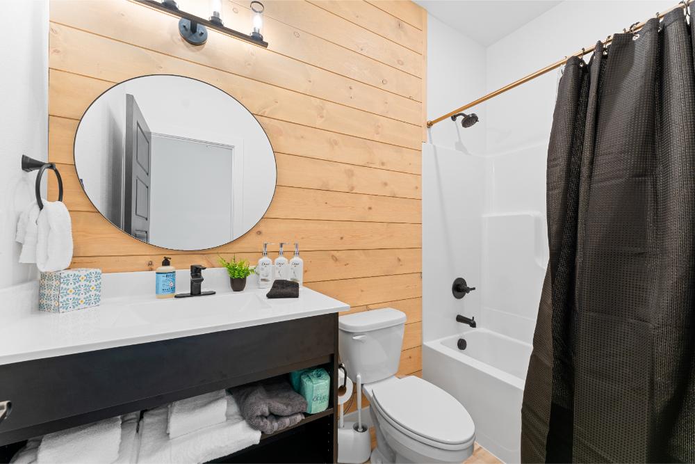 This private bathroom includes both a soaking tub and shower for a relaxing and convenient experience.