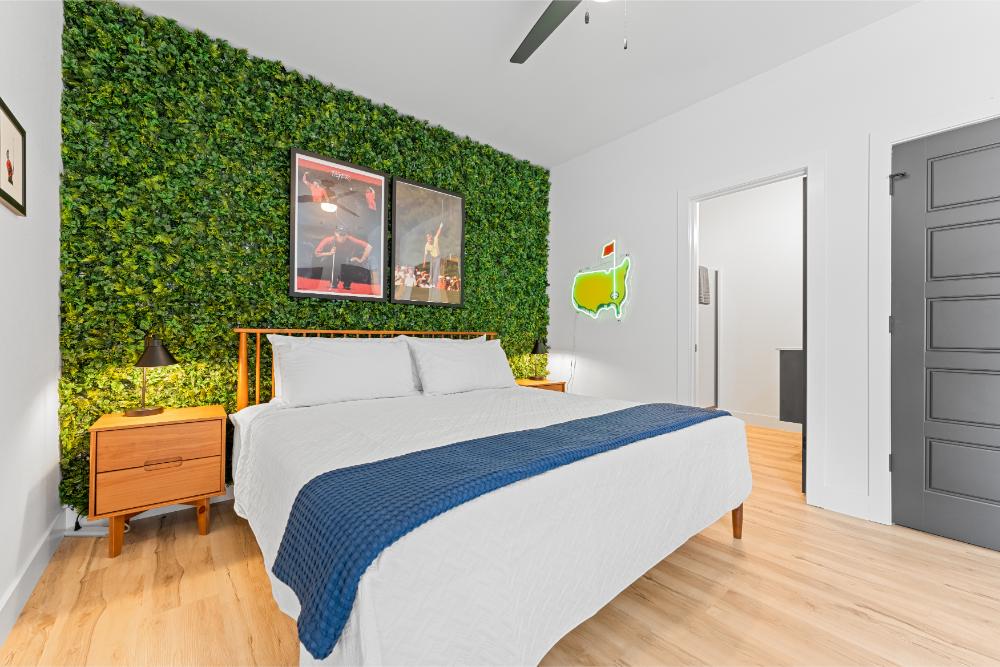 Golf-themed king bedroom offers a private ensuite bathroom and stylish décor inspired by the game.