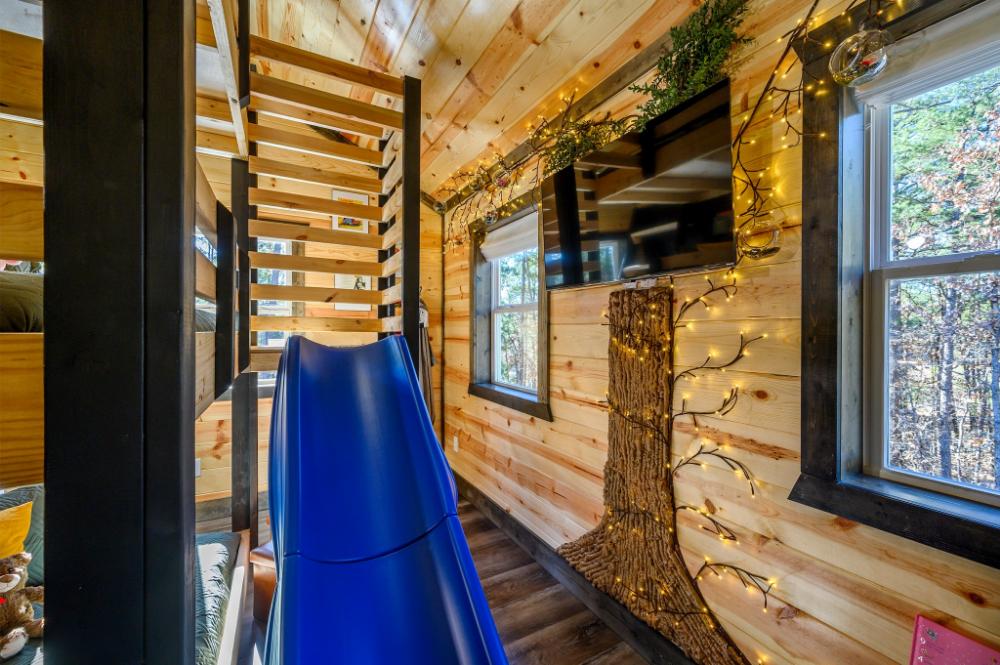 A colorful and playful bunk room where kids can relax, play, and enjoy their own special space.