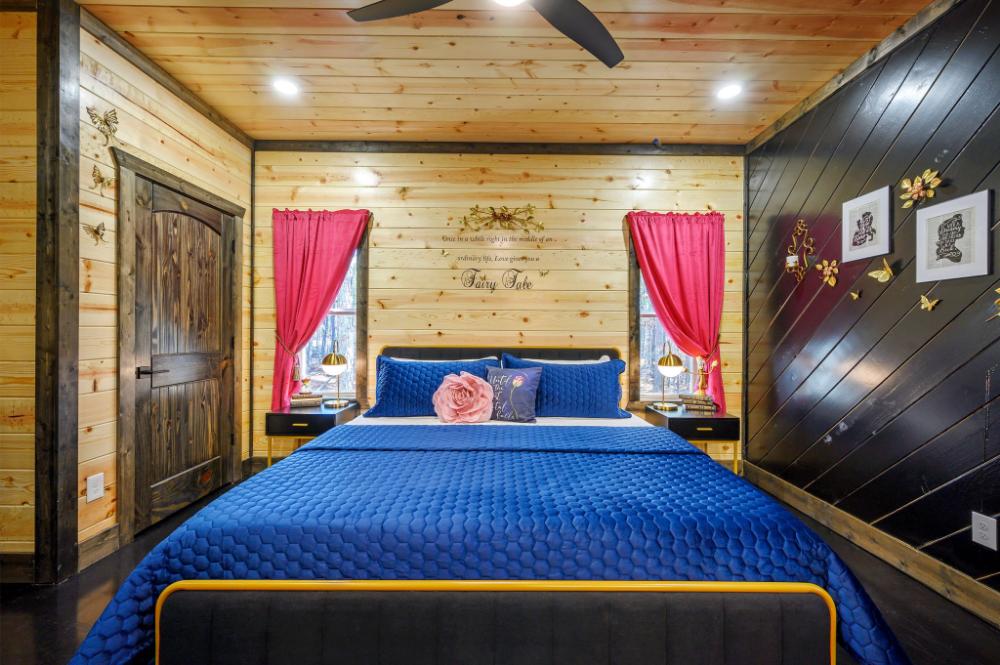 A magical retreat where themed details and a comfortable king bed create a relaxing place to rest.