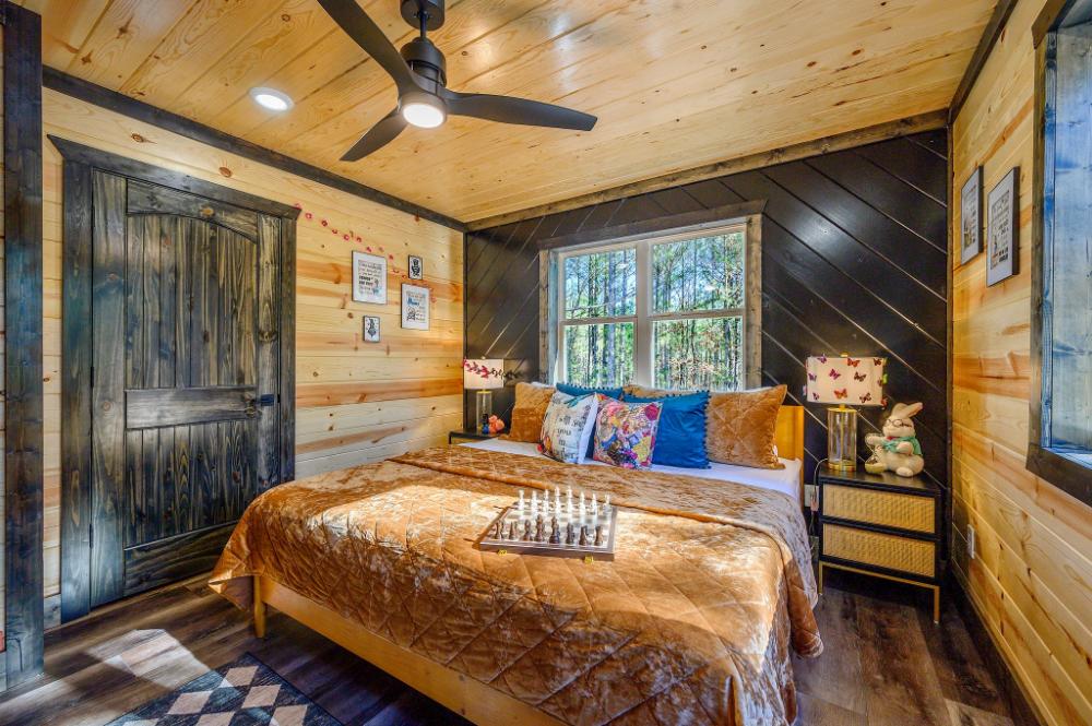 A whimsical room full of character where playful design meets a cozy place to rest.