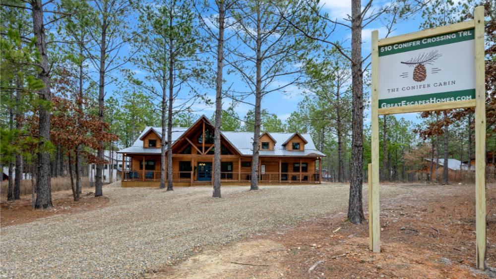 Welcome to THE CONIFER CABIN by Great Escapes Homes in Broken Bow, offering a blend of outdoor fun and comfortable indoor living.
