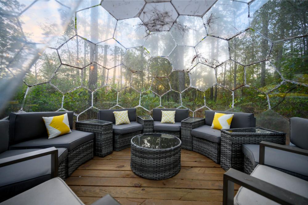 The cozy hypedome lounge offers a unique, sheltered space to relax and enjoy nature in comfort.