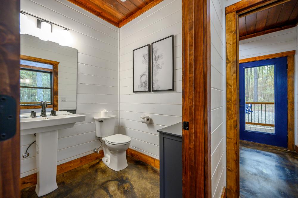 Easy access powder room just steps from the laundry—perfect for guests or quick clean-ups 