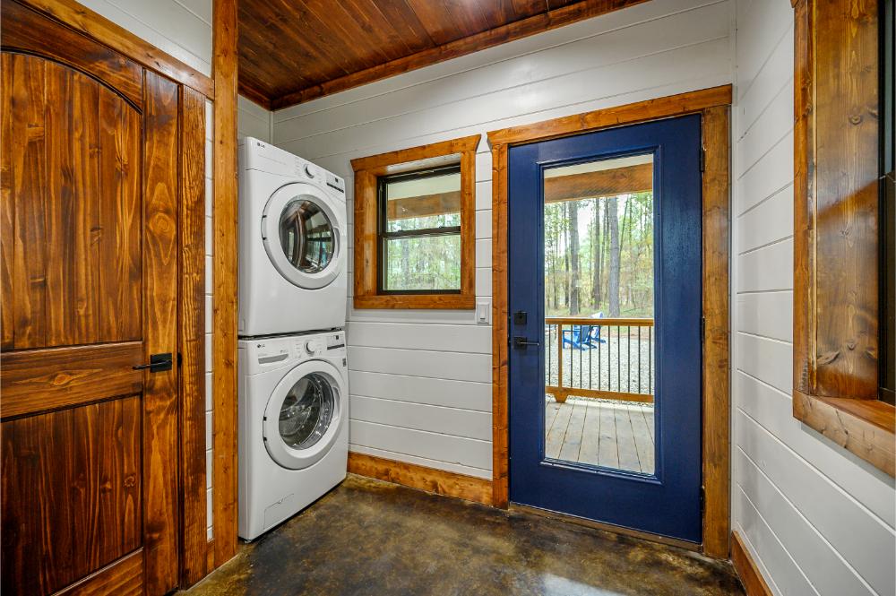 Toss in a load anytime with the full-size washer and dryer just off the main living area 