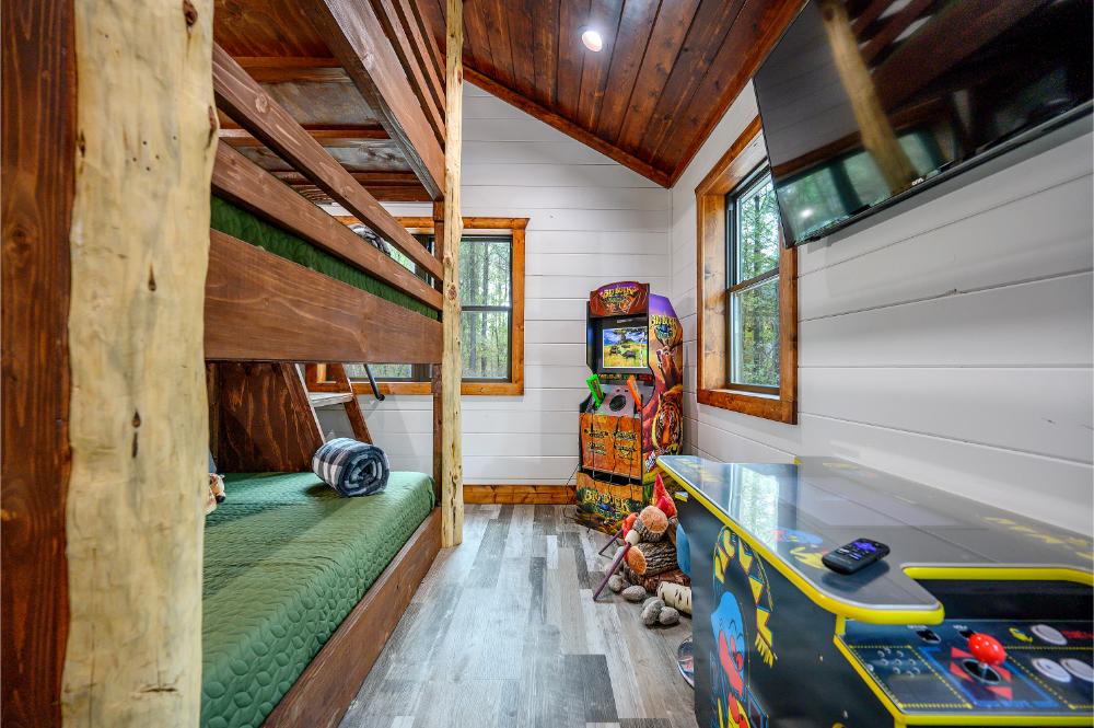 Game on! Ms. Pacman, Buck Hunter, and cozy bunks make this a favorite hangout 