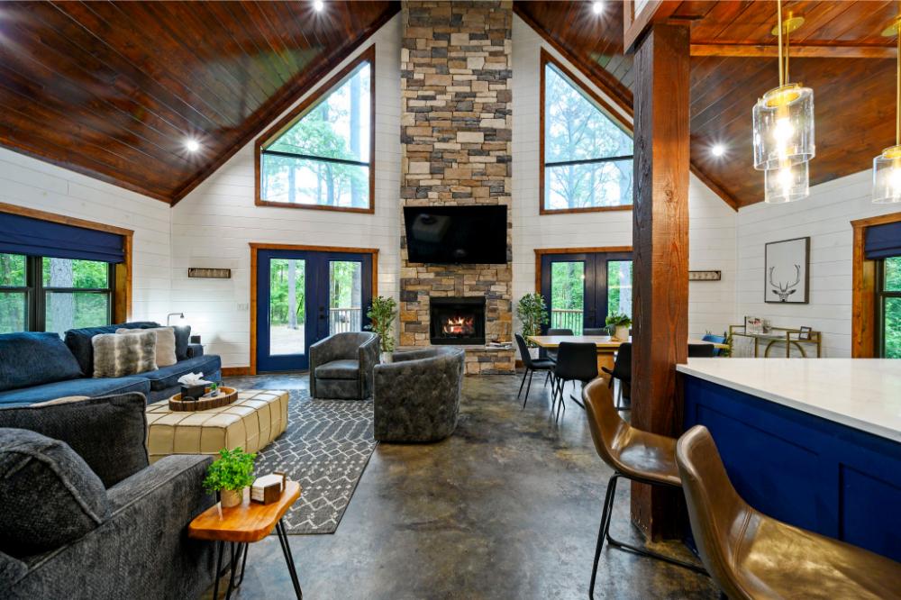 Tall ceilings and comfortable seating make this open living room ideal for relaxing together.