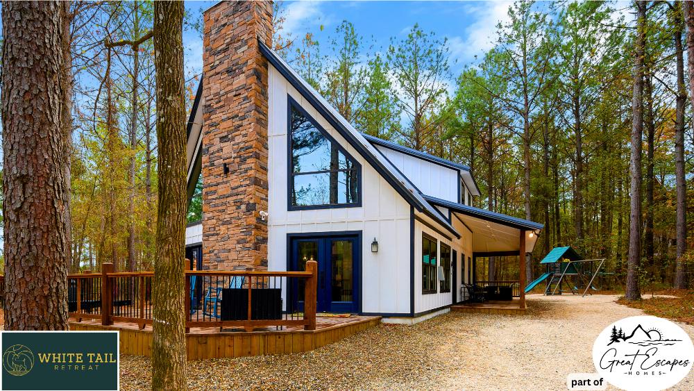 Enjoy the hot tub, playset, and fire pit at White Tail Retreat, all designed for relaxation and fun.
