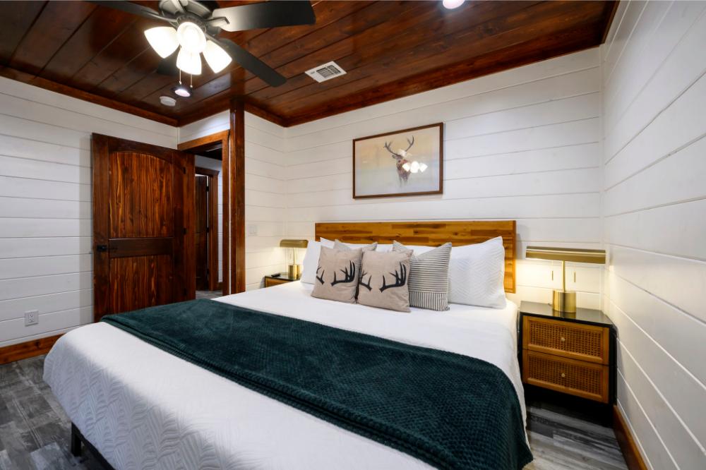 King bedroom with Smart TV and storage for guest convenience.