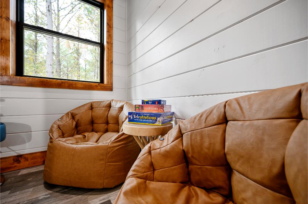 Relax in the bean bag seating area, perfect for gaming, movies, or casual hangouts.
