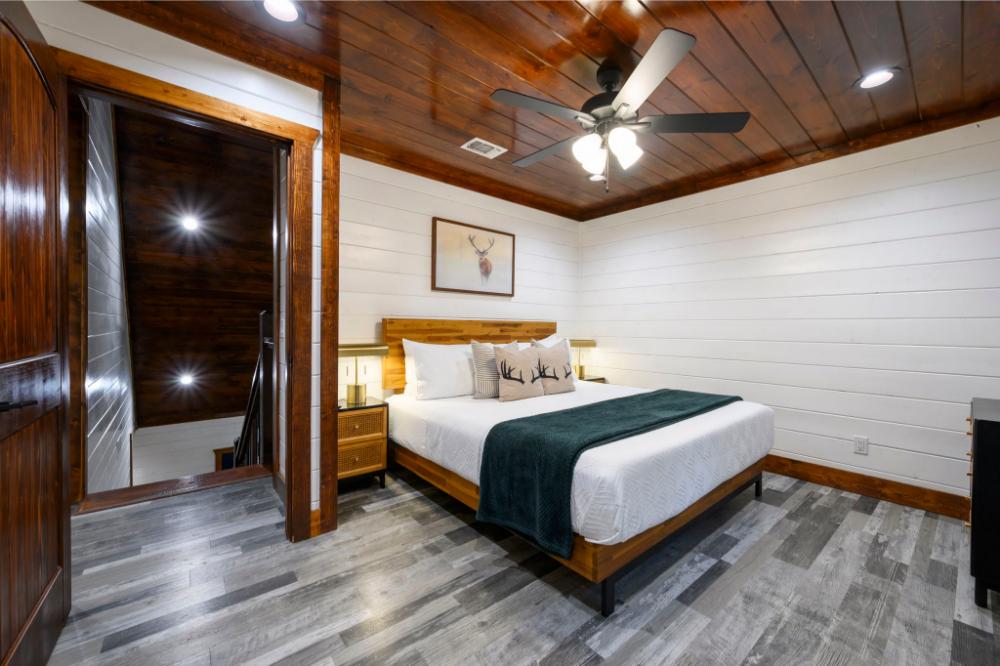 Located just steps from the upstairs bathroom, this bedroom offers comfort and convenience.