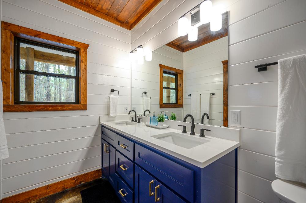 This double vanity offers ample space and storage for all your essentials.