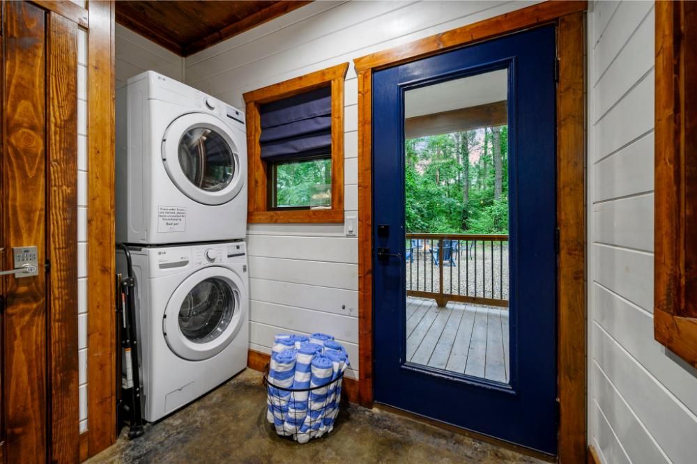 This main floor laundry room allows you to wash, dry, and fold with ease during your stay.
