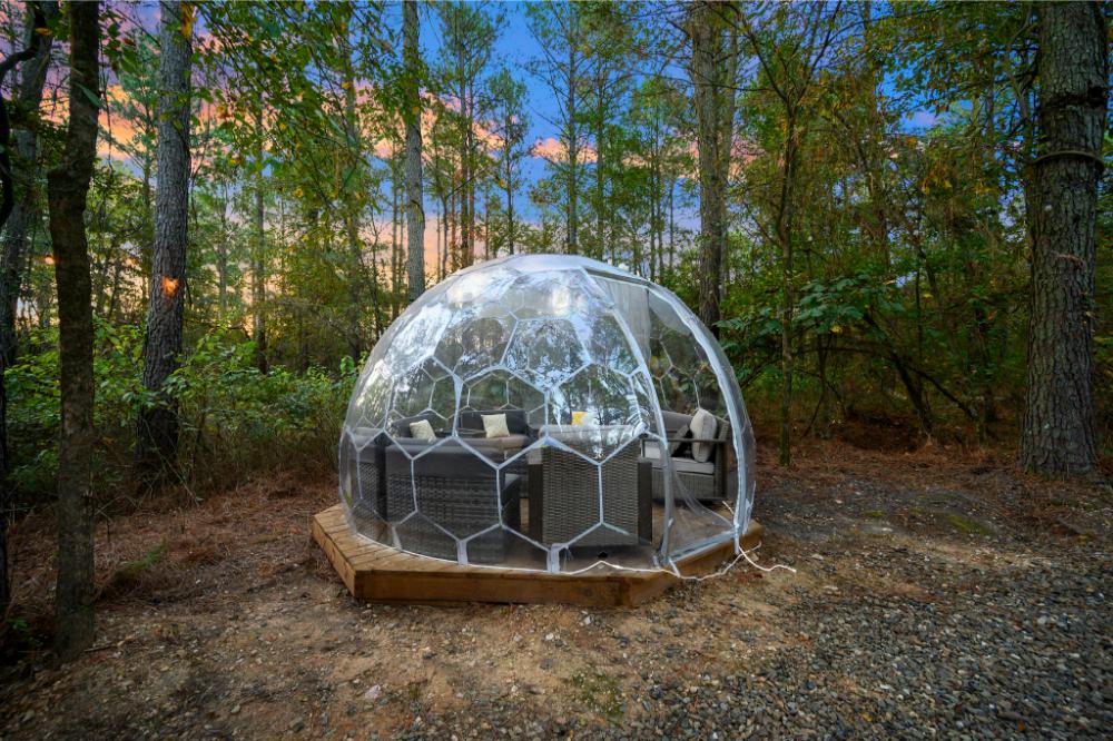 Enjoy this unique Hypedome, a fun escape nestled among the trees in Broken Bow.